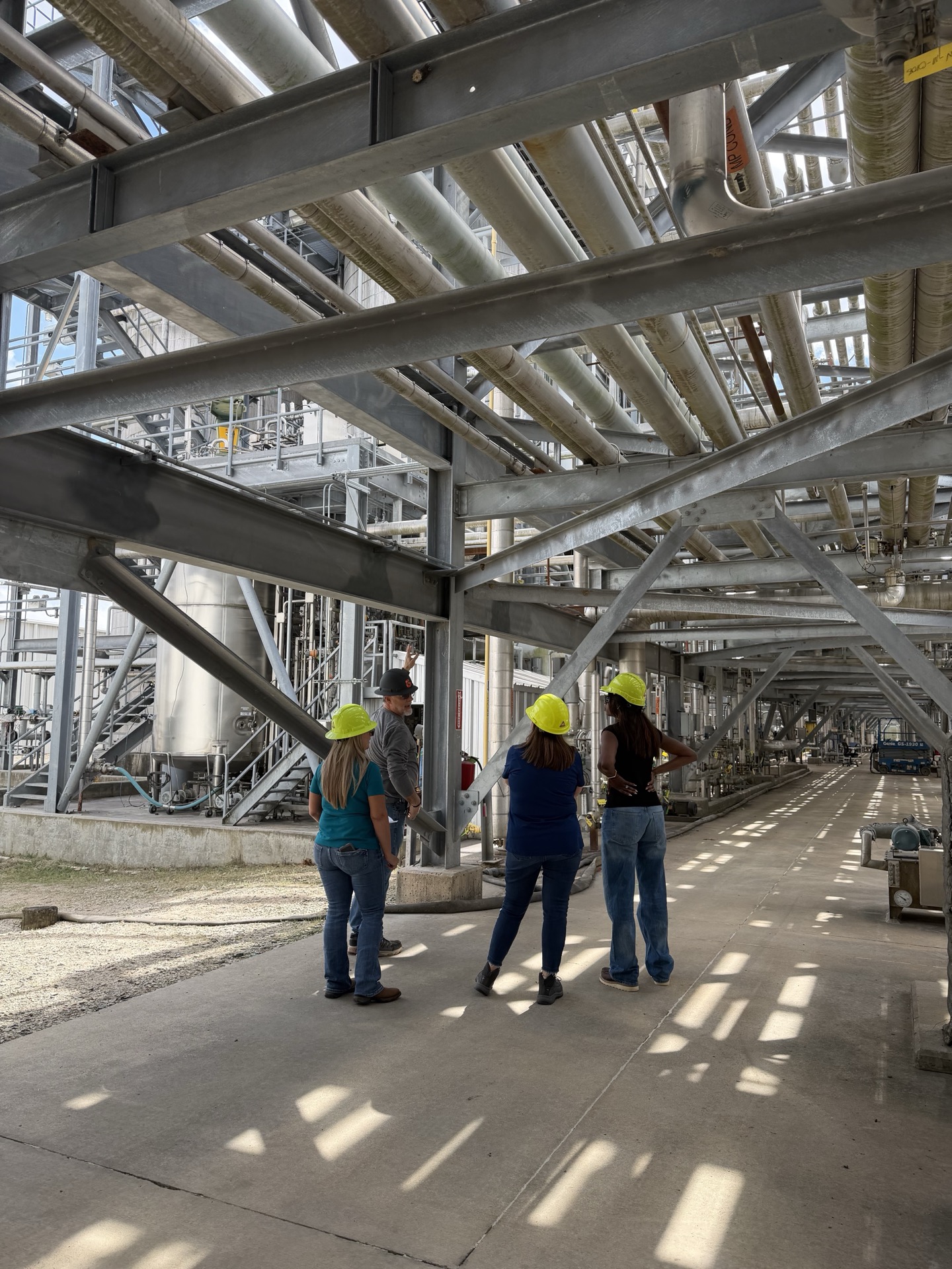 Team walking through the plant