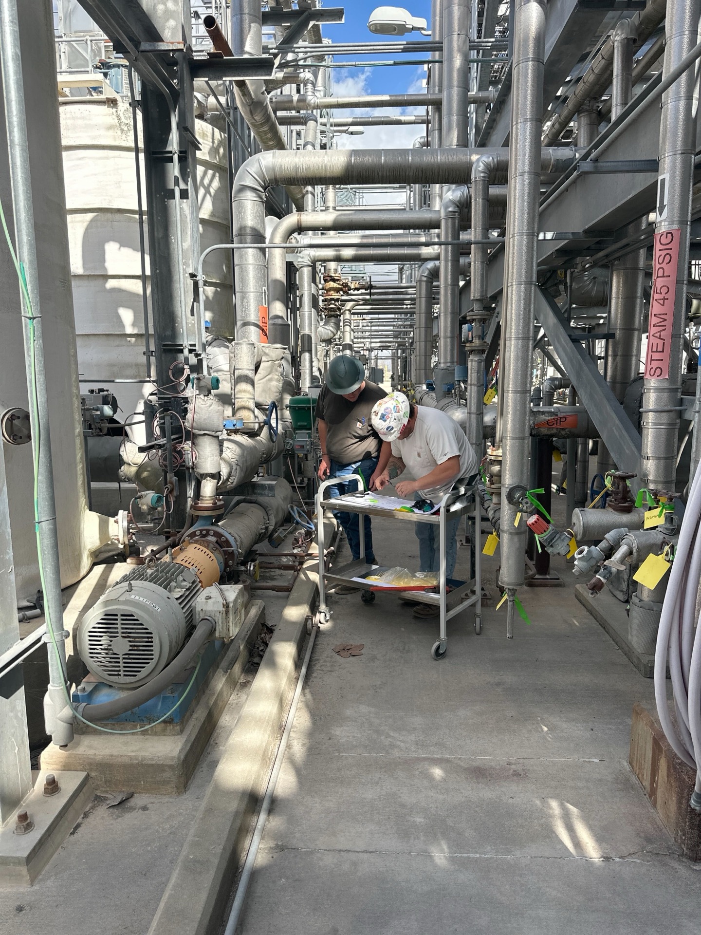 Engineers reviewing plans on site